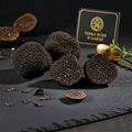 Small fresh Tuber melanosporum specimens showing natural B Grade variation