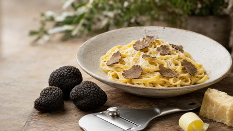 Fresh Tuber aestivum shaved over warm tagliatelle with Parmesan