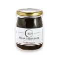 Barattolo di salsa al tartufo con coperchio ed etichetta dorati, Salsa Tartufata con contenuto nero